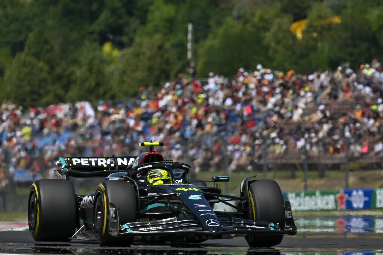 British Formula One driver Lewis Hamilton of Mercedes-AMG Petronas steers his car during the third free practice ahead of Sunday's Formula One Hungarian Grand Prix auto race, at the Hungaroring racetrack in Mogyorod, near Budapest, Hungary, Saturday, July 22, 2023. (AP Photo/Denes Erdos)